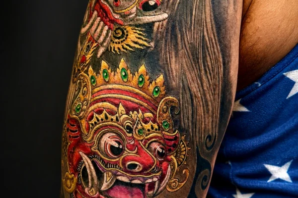 balinese-demon-mask-sleeve-tattoo-design-wicked-ways-tattoos